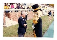 Generated thumbnail: Edwin Graves Wilson with the Deacon mascot