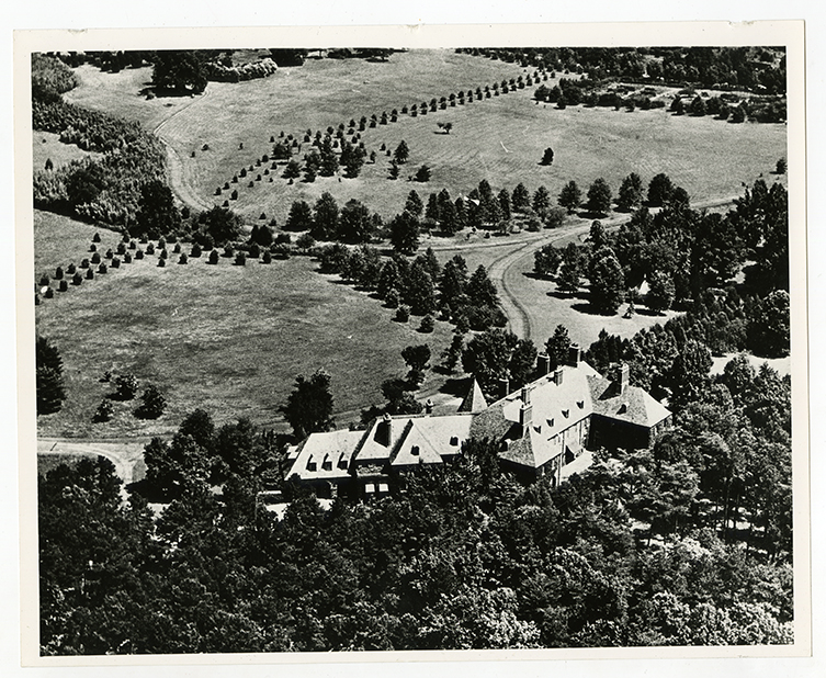 Aerial view of Grayln Estate with curved driveway and expansive lawn