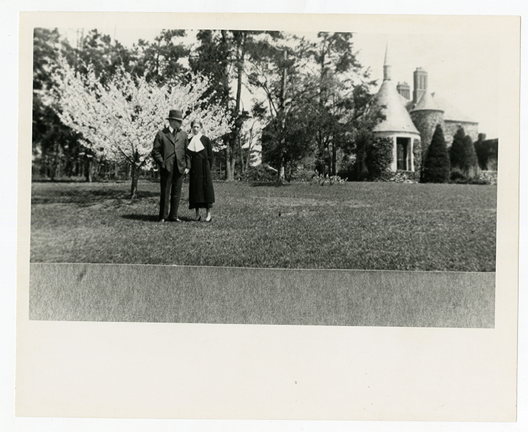 Couple posing in front of a Graylyn Estate