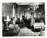 Generated thumbnail: Woman in ornate living room at Graylyn Estate mansion