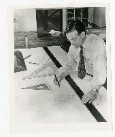 Generated thumbnail: Architect at work on design sketches