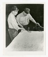 Generated thumbnail: Two men collaborate on architectural design