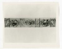 Generated thumbnail: Decorative iron panel with animal motifs