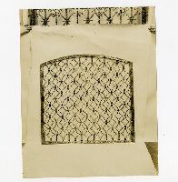 Generated thumbnail: Intricate wrought iron grille panel 02
