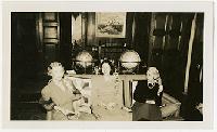 Generated thumbnail: Three Women Seated in a Formal Room