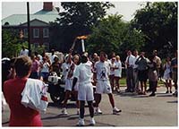 Generated thumbnail: Atlanta Olympics torch relay in front of library