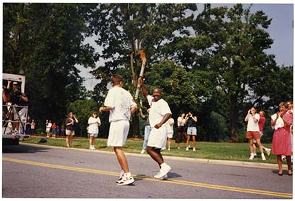 Atlanta Olympics torch relay in front of library