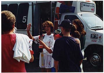 Atlanta Olympics torch relay in front of library