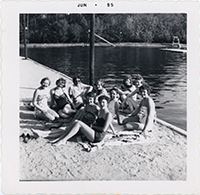 Generated thumbnail: Delta Kappa Nu Business Society in bathing suits at a lake near Wake Forest