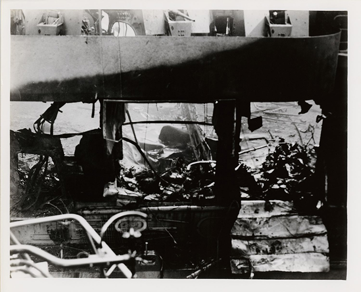 View of damage to hanger deck of the 4th USS Princeton (CLV-23), seen through blown-out side of hangar