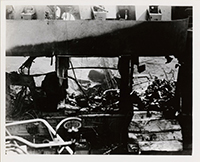 Generated thumbnail: View of damage to hanger deck of the 4th USS Princeton (CLV-23), seen through blown-out side of hangar.
