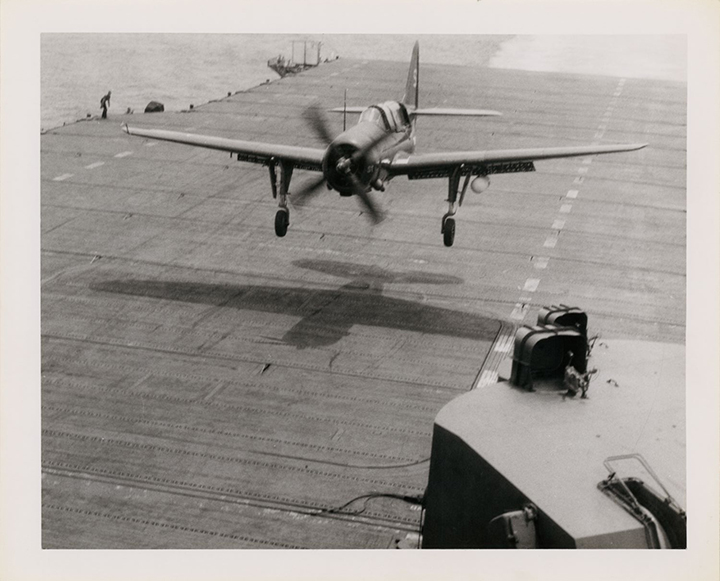 SB2C Helldiver landing on deck of aircraft carrier USS Princeton (CV-37)