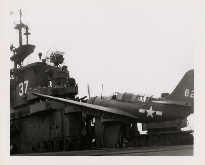 SB2C Helldiver tail number 62 landing on deck of aircraft carrier USS Princeton (CV-37)