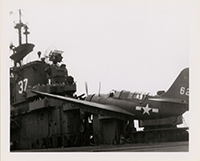 Generated thumbnail: SB2C Helldiver tail number 62 landing on deck of aircraft carrier USS Princeton (CV-37).