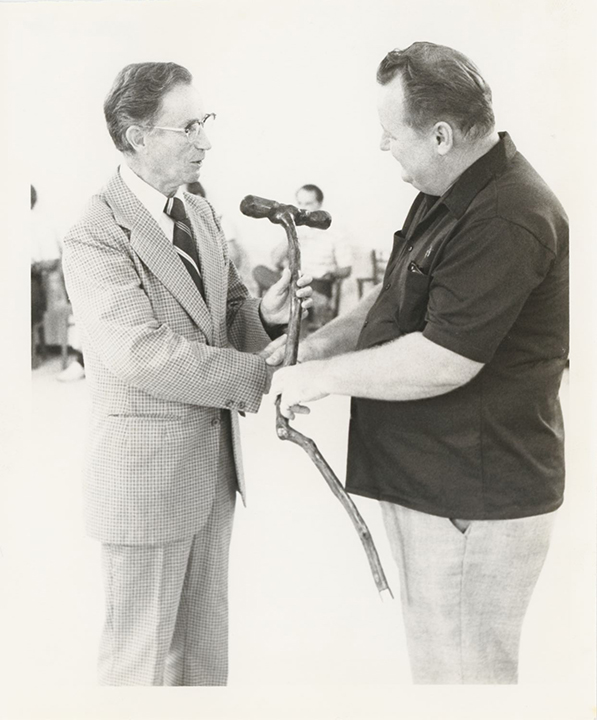 Dr James Blackmore receives a crooked cane