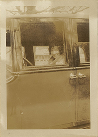 Generated thumbnail: Woman in automobile