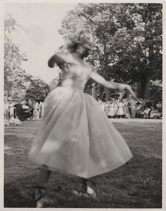 One young woman dances outdoors