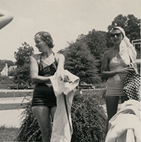Generated thumbnail: Two women in bathing suits at a swim event for the Women's Health Club