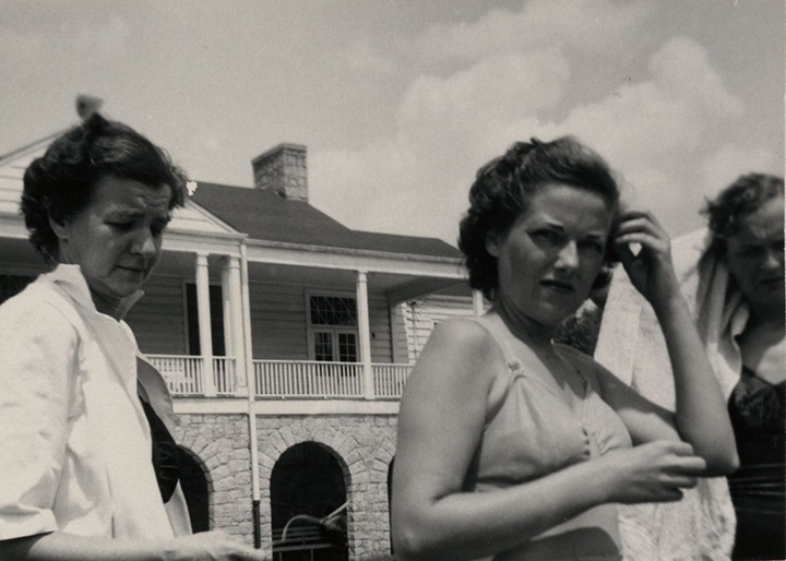 Three women at a swim event for the Women's Health Club