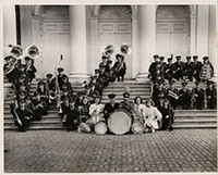 Generated thumbnail: Wake Forest College Marching Band with drum majors and majorettes form "WF" on the steps of Wait Chapel.