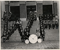 Generated thumbnail: Wake Forest College Marching Band with drum majors and majorettes form "WF" on the steps of Gore Gymnasium.