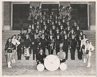 Generated thumbnail: Wake Forest College Marching Band with drum majors and majorettes on the steps of Gore Gymnasium.