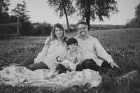 Generated thumbnail: Cane family sitting on blanket outside