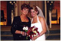 Generated thumbnail: Rita Postolski and Lauren Postolski in bridal photograph